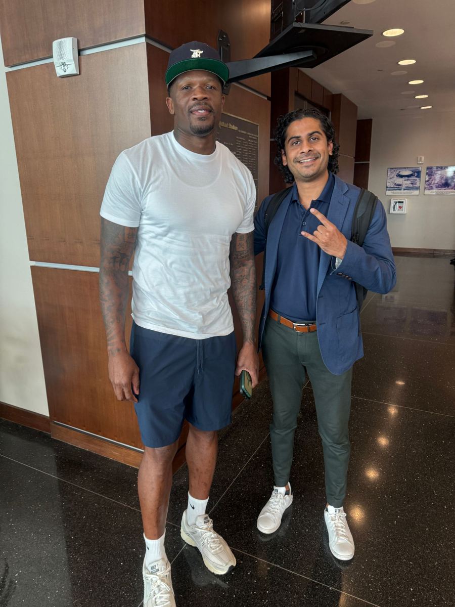 Avi with Texans legend Andre Johnson