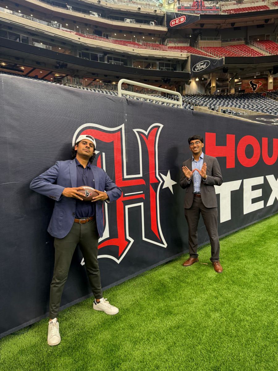 Avi with a football on the field at NRG Stadium